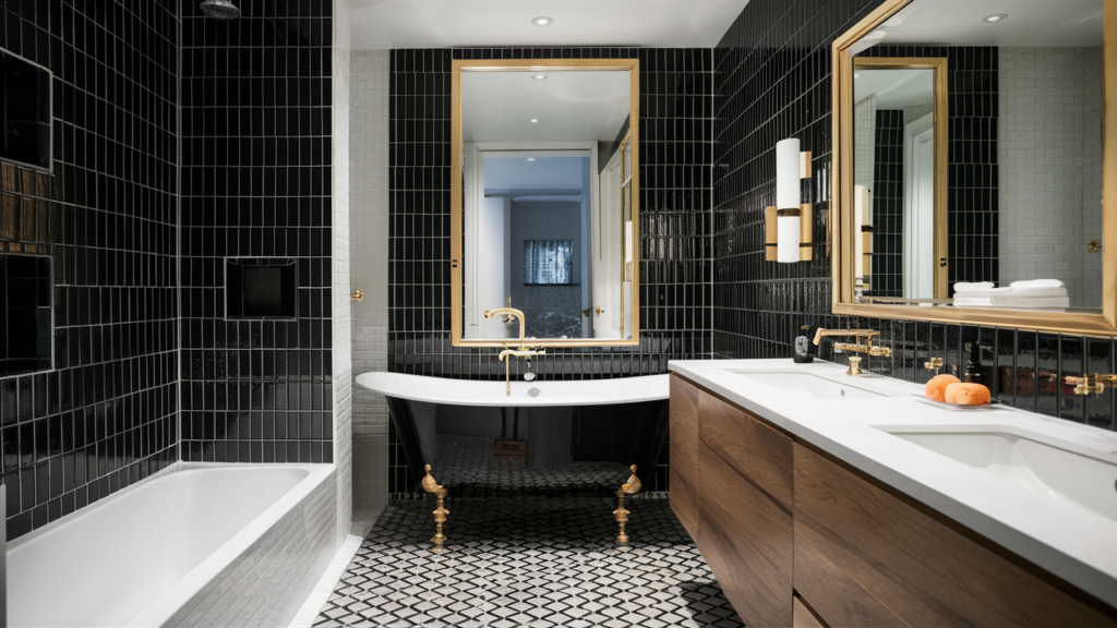 A modern bathroom with black and white tiles