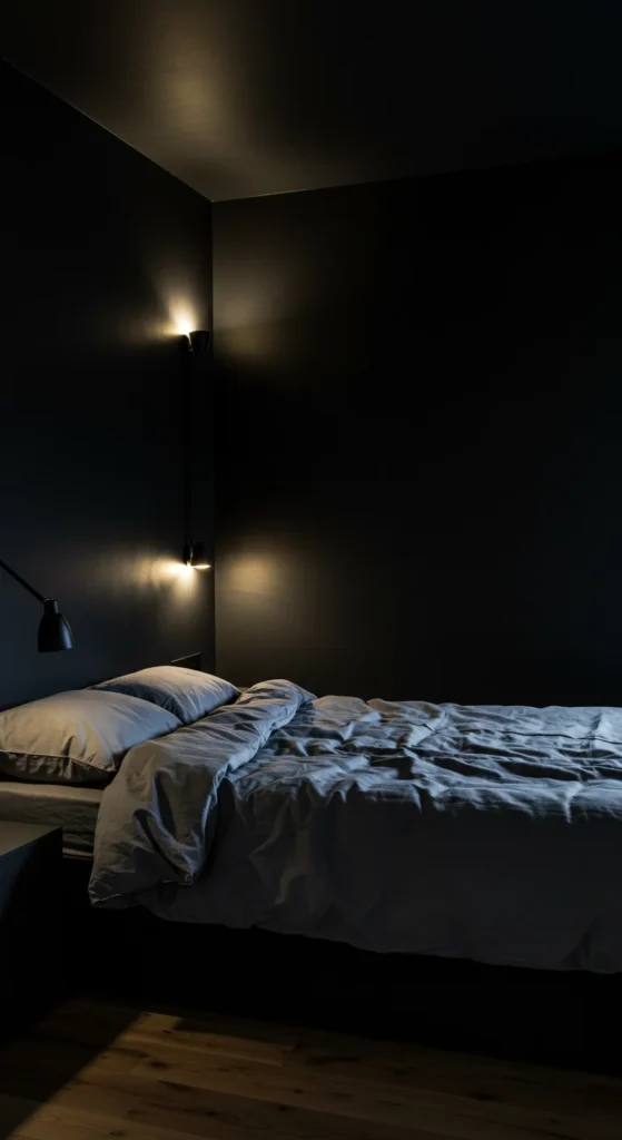 A Minimalist Bedroom With Black Walls