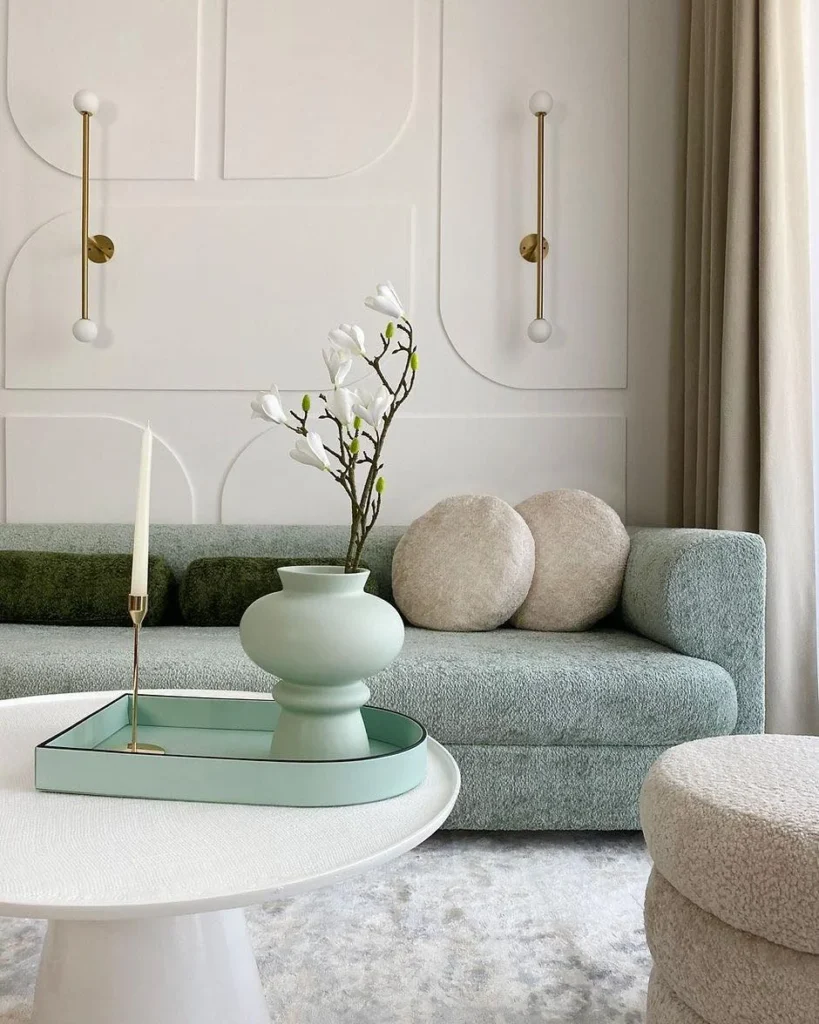 A Minimalist Living Room With Soft Beige Accents And Natural Light