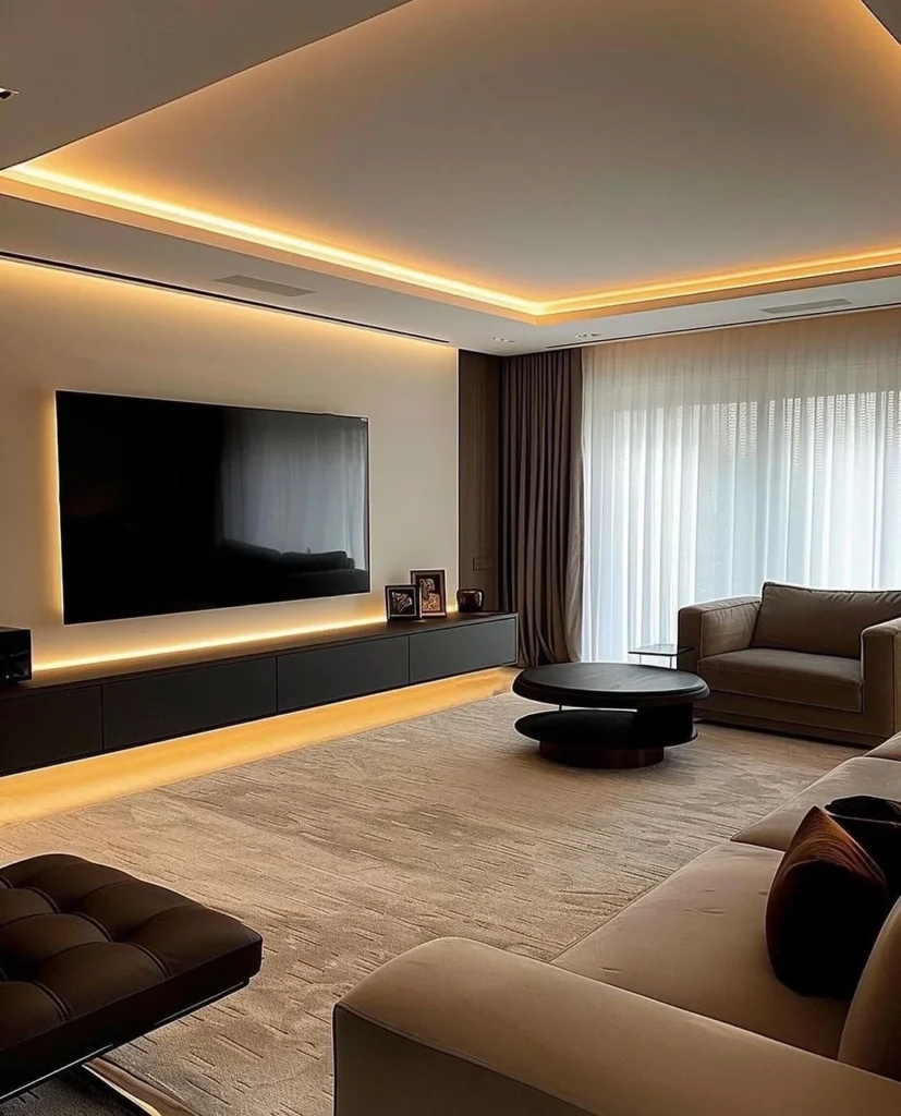 A Sleek And Modern Living Room With Dark Accents And Warm Lighting