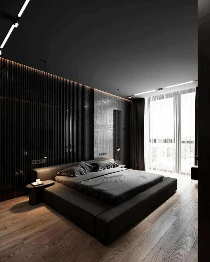 Moody Industrial Bedroom With Modern Chandelier