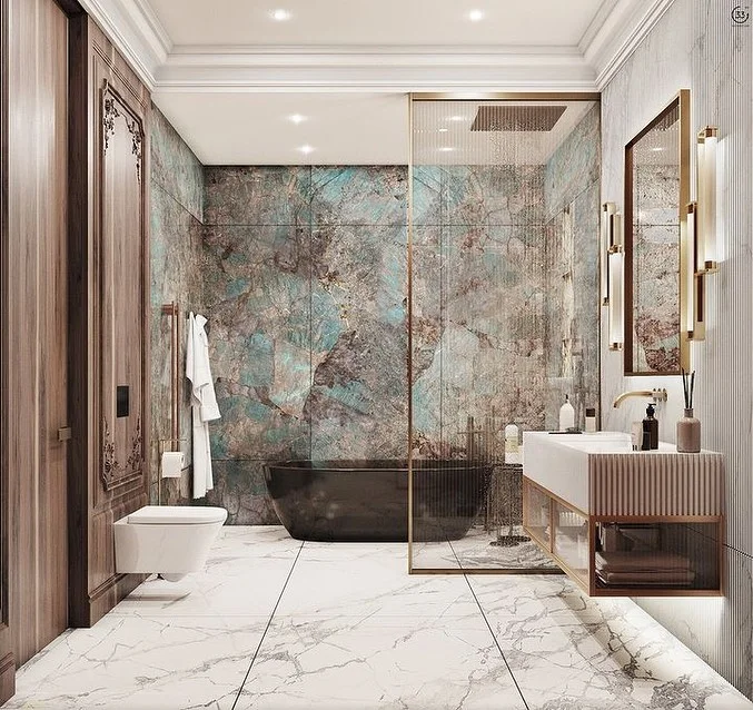 Neutral-toned Bathroom With Marble Walls And Stylish Fixtures