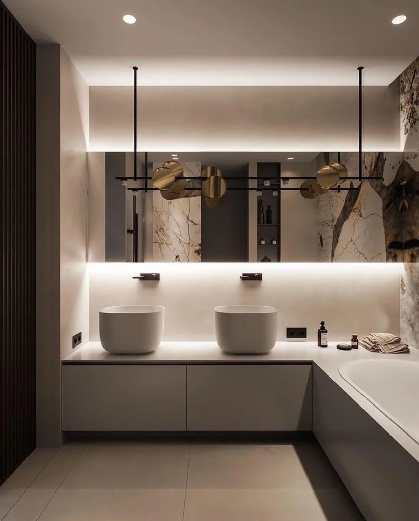 Sleek Bathroom With Floating Vanity And Golden Lighting