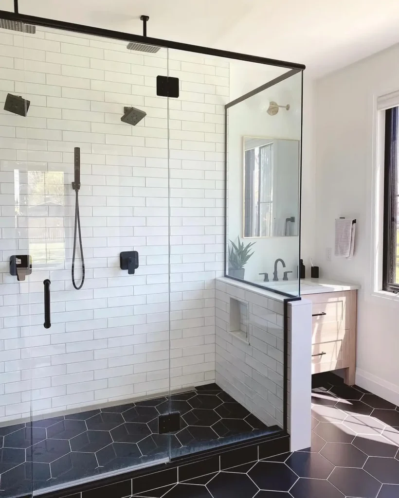 Spacious Walk-in Shower With Black Accents